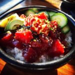 A vibrant spicy tuna poke bowl with chunks of marinated tuna, creamy avocado, sliced cucumber, and a dollop of spicy mayo.